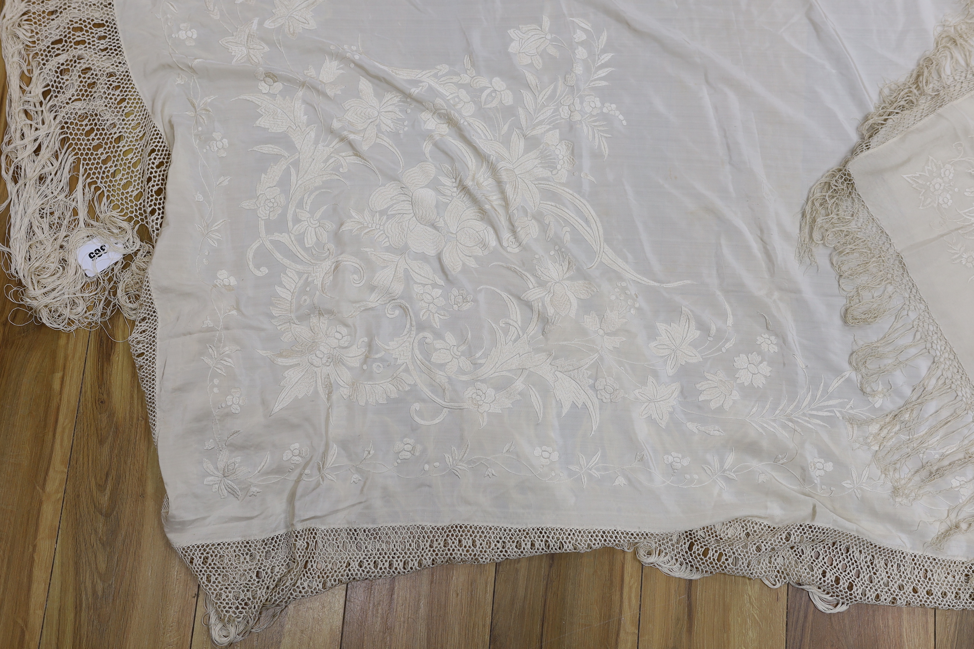 Two silk cream on cream Chinese embroidered shawls